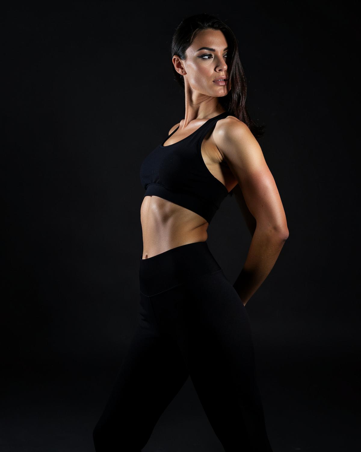 Model wearing a matching sports bra and leggings set